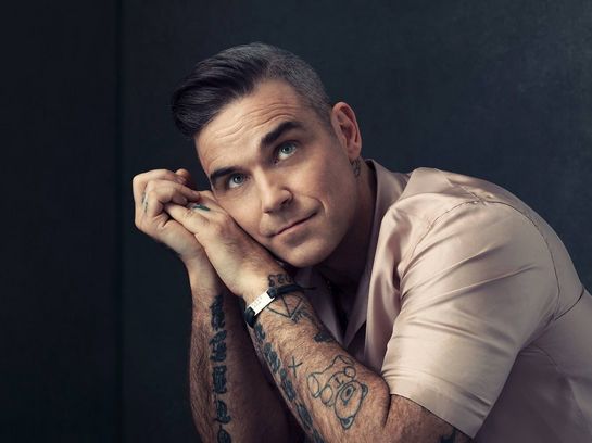 Robbie Williams veröffentlicht sein erstes Weihnachtsalbum.